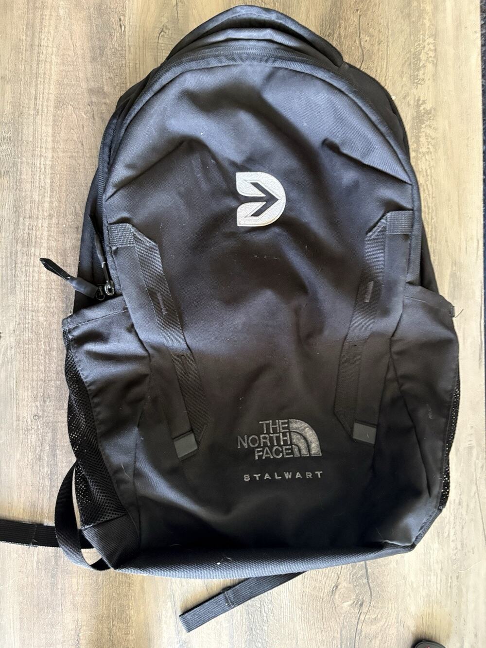 The North Face Stalwart Black Backpack 26L Laptop Sleeve Company Logo